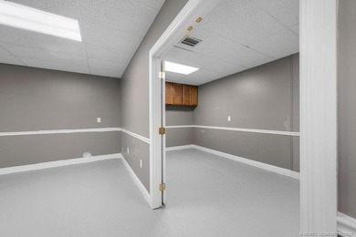 Bright, open showroom with newly applied SunDek finished floors - photo 3