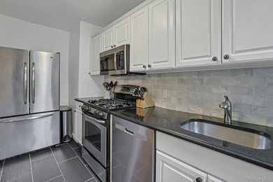 Located in the well-established Wykagyl Gardens community, this - photo 14