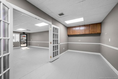 Bright, open showroom with newly applied SunDek finished floors - photo 4