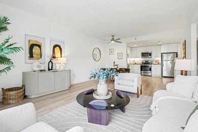 Experience modern city living at its finest in this sleek - photo 2