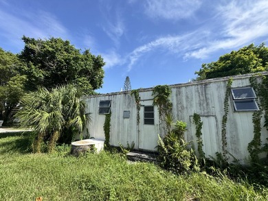 Investor/Handyman/Tear Down Special sold AS-IS in Boca Raton! - photo 4