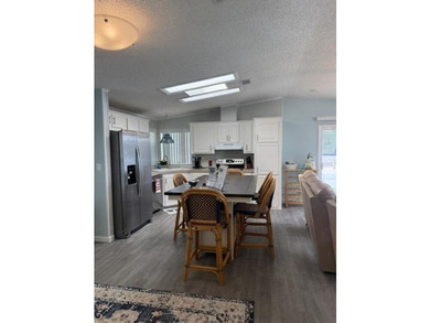 Welcome to this charming 2-bedroom, 2-bathroom residence located - photo 4