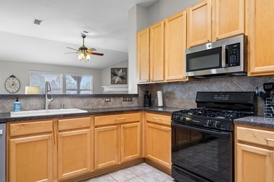Welcome to this beautifully maintained 4-bedroom, 2-bath - photo 11