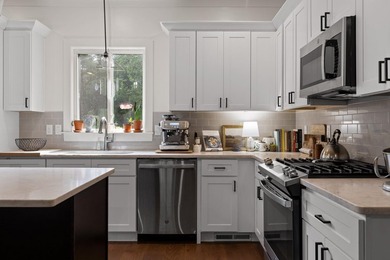 Tucked away on a quiet, country road, this charming like-new - photo 14