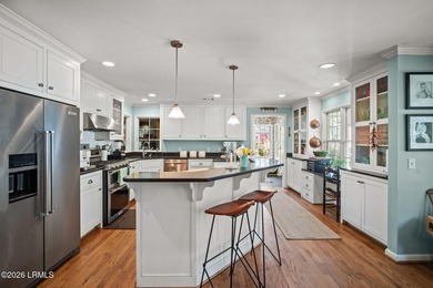 Set on a .66-acre waterfront lot along tidal Battery Creek, this - photo 16