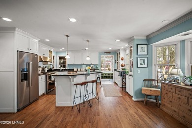 Set on a .66-acre waterfront lot along tidal Battery Creek, this - photo 17