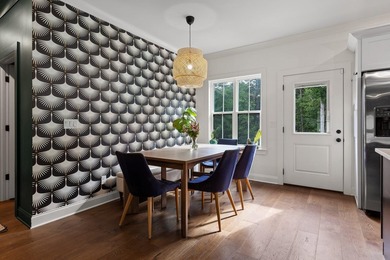 Tucked away on a quiet, country road, this charming like-new - photo 18
