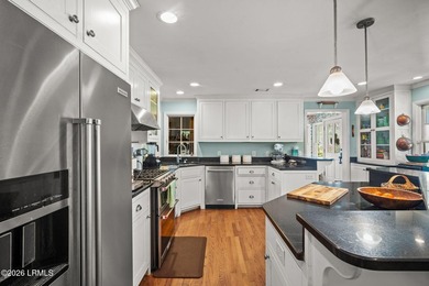 Set on a .66-acre waterfront lot along tidal Battery Creek, this - photo 19