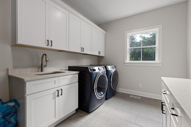 Tucked away on a quiet, country road, this charming like-new - photo 21