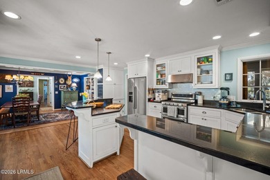 Set on a .66-acre waterfront lot along tidal Battery Creek, this - photo 24