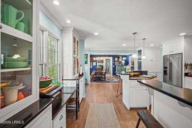 Set on a .66-acre waterfront lot along tidal Battery Creek, this - photo 25