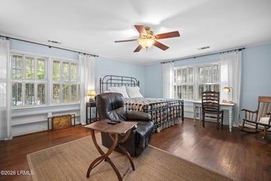 Set on a .66-acre waterfront lot along tidal Battery Creek, this - photo 30