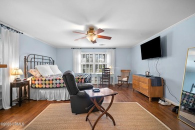 Set on a .66-acre waterfront lot along tidal Battery Creek, this - photo 32