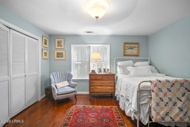 Set on a .66-acre waterfront lot along tidal Battery Creek, this - photo 36