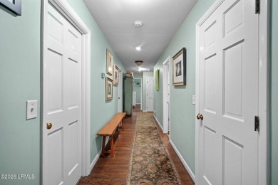 Set on a .66-acre waterfront lot along tidal Battery Creek, this - photo 37
