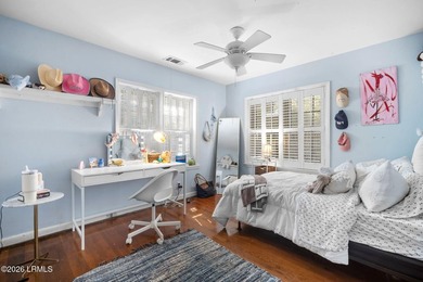 Set on a .66-acre waterfront lot along tidal Battery Creek, this - photo 38