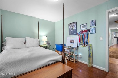 Set on a .66-acre waterfront lot along tidal Battery Creek, this - photo 40