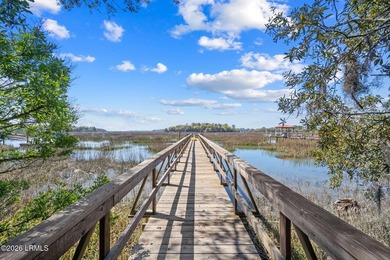 Set on a .66-acre waterfront lot along tidal Battery Creek, this - photo 43