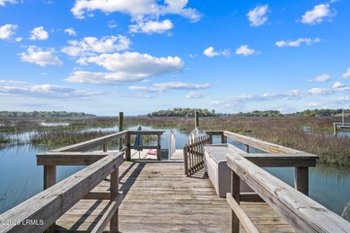 Set on a .66-acre waterfront lot along tidal Battery Creek, this - photo 44