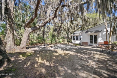 Set on a .66-acre waterfront lot along tidal Battery Creek, this - photo 50