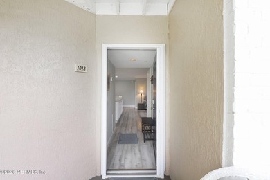 What a Belleza Beauty! This exceptional first-floor, waterfront - photo 6