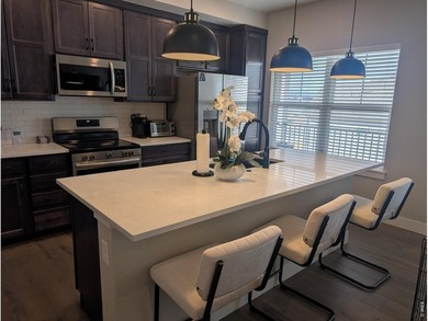 Looking for easy living or a turnkey rental opportunity? This