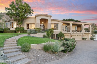 Tucked within the secluded Guard Gated Biltmore Hillside