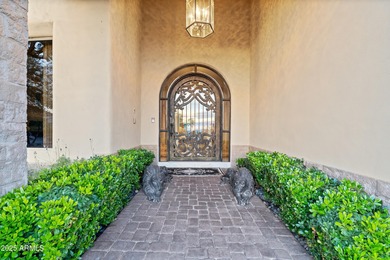 Tucked within the secluded Guard Gated Biltmore Hillside