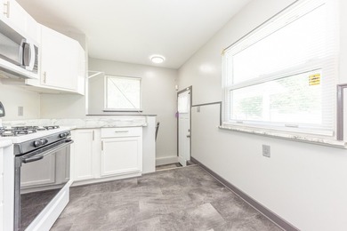 Quiet tree lined street this 3BR/2BA ranch home is located in a - photo 12