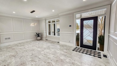 This beautifully remodeled home blends modern comfort with - photo 11