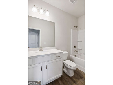 Built by EMC Homes GA, *Move-in Ready July 2026* *** $20,000 in - photo 13