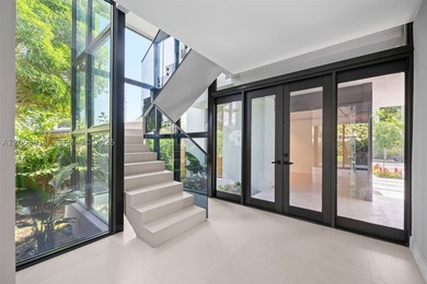 4-bedroom, 4-bath contemporary residence with an air-conditioned - photo 3