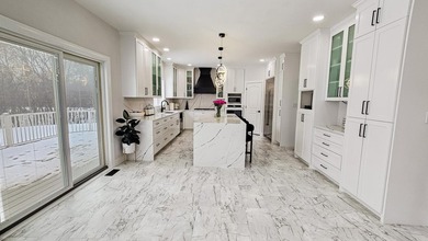 This beautifully remodeled home blends modern comfort with - photo 16