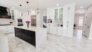 This beautifully remodeled home blends modern comfort with - photo 17