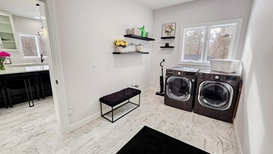 This beautifully remodeled home blends modern comfort with - photo 18