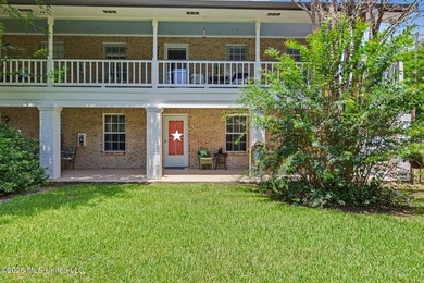 Enjoy coastal living in this beautifully updated first-floor - photo 1