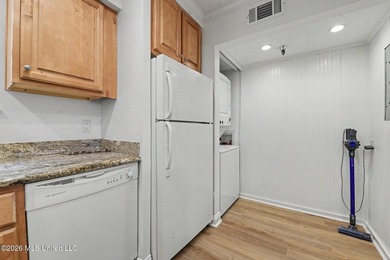 Enjoy coastal living in this beautifully updated first-floor - photo 9