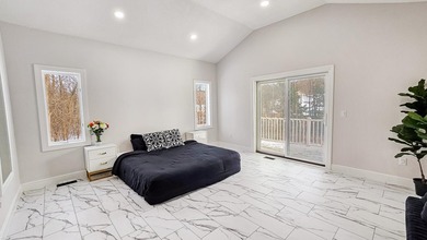 This beautifully remodeled home blends modern comfort with - photo 33