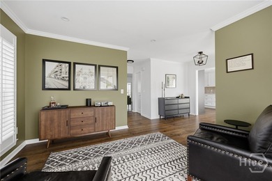 Nestled in the gated community of Dutch Island, this beautifully - photo 4