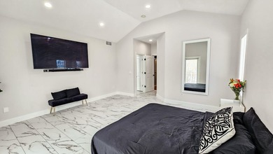 This beautifully remodeled home blends modern comfort with - photo 34