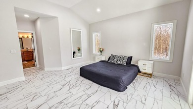 This beautifully remodeled home blends modern comfort with - photo 35