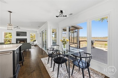 Nestled in the gated community of Dutch Island, this beautifully - photo 6