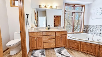 This beautifully remodeled home blends modern comfort with - photo 36