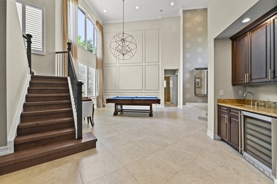 Welcome to this exceptional two-story estate in the exclusive - photo 11