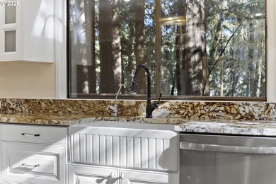 Tucked away on nearly 7 acres of serene, forested privacy, this - photo 13