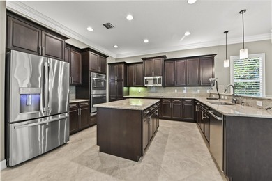 Welcome to this exceptional two-story estate in the exclusive - photo 15