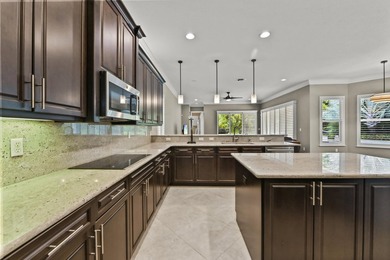 Welcome to this exceptional two-story estate in the exclusive - photo 17