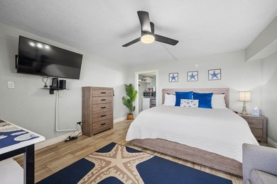 Wake up to sweeping bay views and effortless coastal living at - photo 18