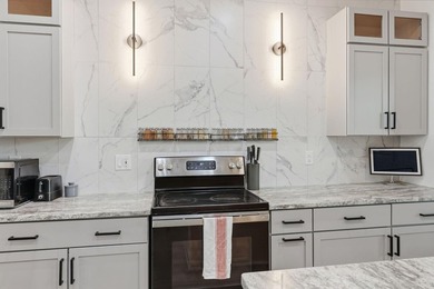 Perfectly positioned on a beautiful corner lot in the highly - photo 11