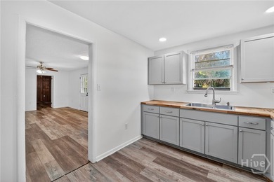 Welcome to this 3 bedroom, 1 bathroom home located in the - photo 8